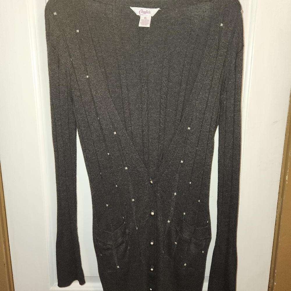 Gray long button up cardigan with front pockets, silver buttons & studs.